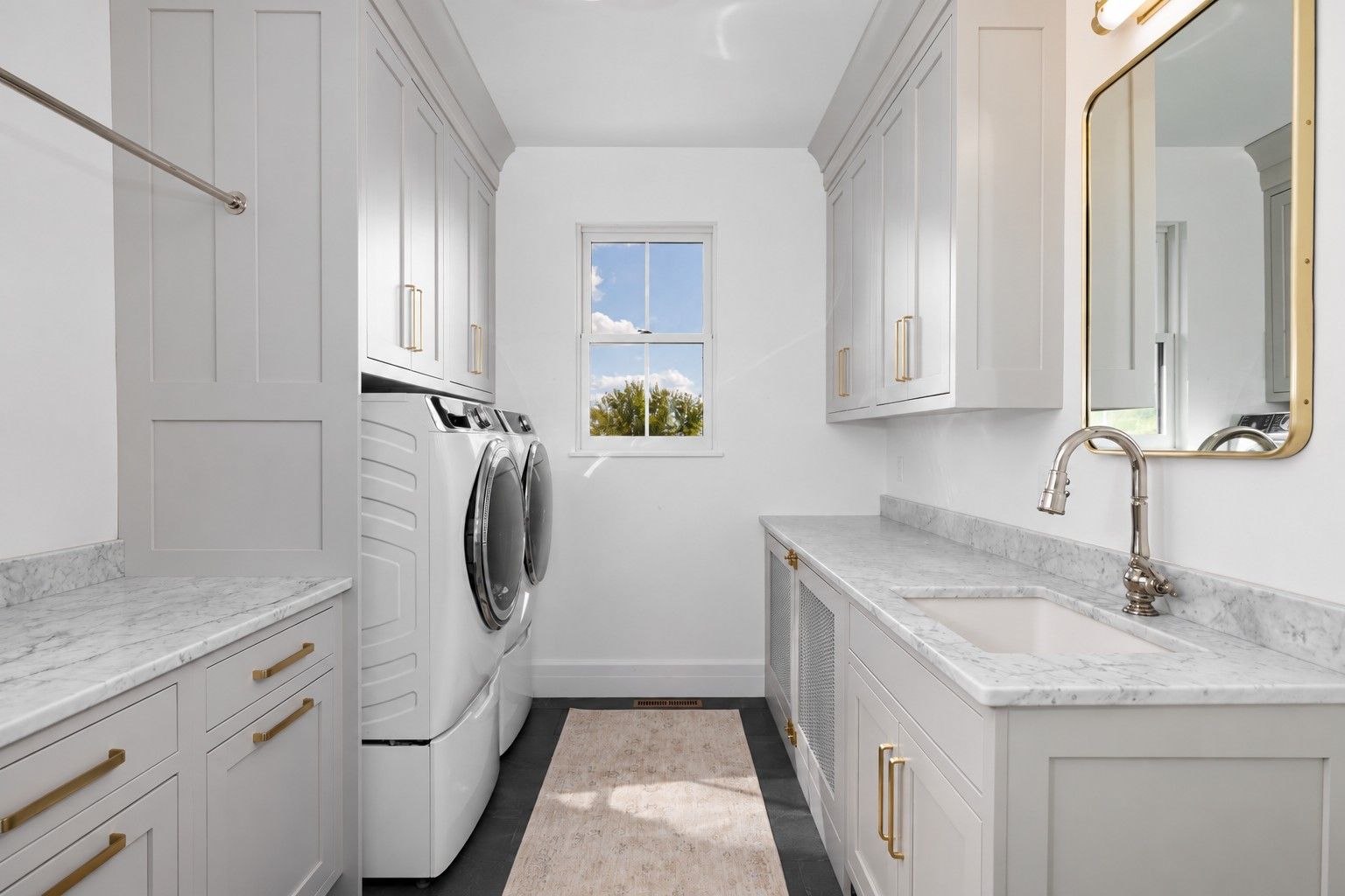 Custom Laundry with Marble Countertops